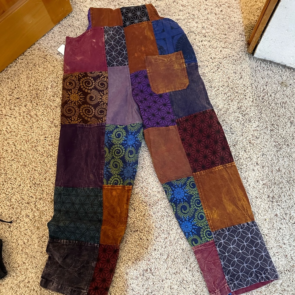 Cute brand new patched overalls.  Did not fit.  Tags still on.